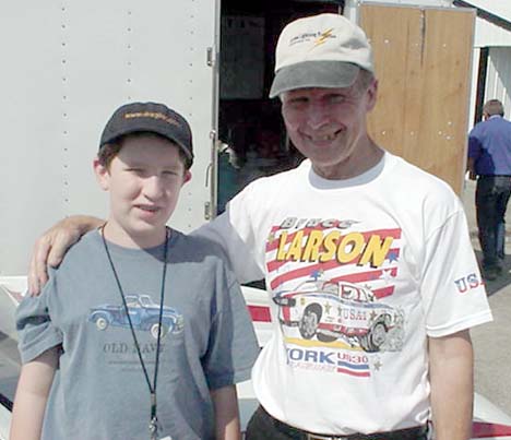 My 12 year old with a drag racing star I've been a fan of since *I* was 12 years old -- Bruce Larson. 