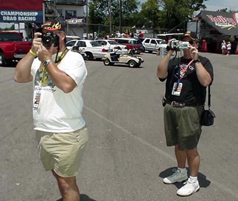 And then springing into action... John Ewald with a camera and Walt Huff's son Gary with the video camera.