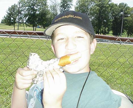 We pulled down to the top end to catch the 2nd round of eliminations and to enjoy a few corn dogs. Obviously, they met with the gourmand's approval...