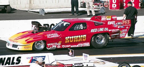 Kirk Kuhns became one of the quickest cars in Competition Eliminator history with amazing 6.30s at 220 mph in his Pro Mod-Comp Corvette. Photo by Robert Briggs