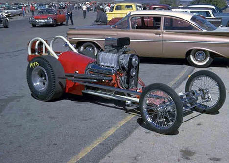 Henkel's machine at rest in the pits. Can you believe the length? Photo by Pete Garramone