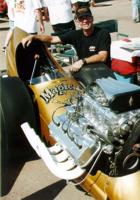 Bill Pitts is justifiably proud of his immaculate fuel dragster restoration. Photo by Jim Hill