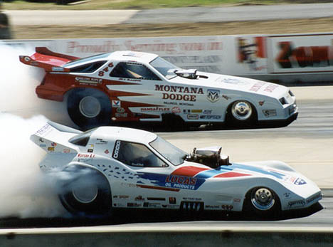 Darrell Webb and Jamie Kemp nail side by side burnouts in Northwest Funny Car action. Photo by Sheryl Ogonoski