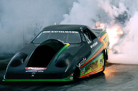 Bob Sattelmaier's Super Sonic Jet Funny Car lights up the house. Photo by Brian Wood