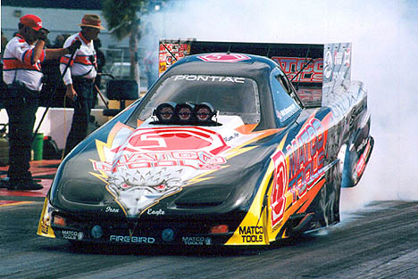 Love him or hate him, Whit Bazemore is the quickest and fastest funny car driver in history. Photo by Ronnie Lahr