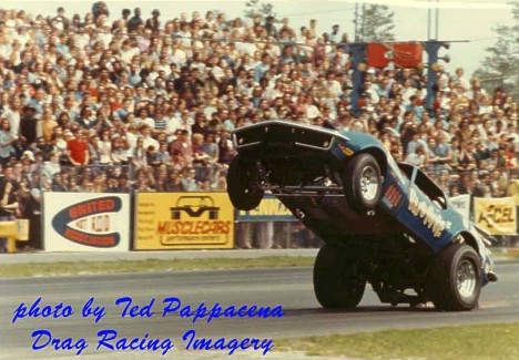 Tommy McNeely's Fugitive Corvette Wheelstander aims for the sky. Photo by Ted Pappacena