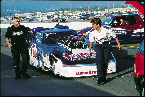 Bill Kuhlmann and crewchief Vicky Shiels prepare the Summit Racing Corvette Nitro Coupe for the next round. Photo courtesy of Summit Racing