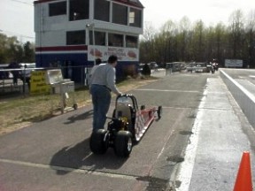 Dad leads Jason back to the staging lanes after a time run. Photo by Tim Pratt