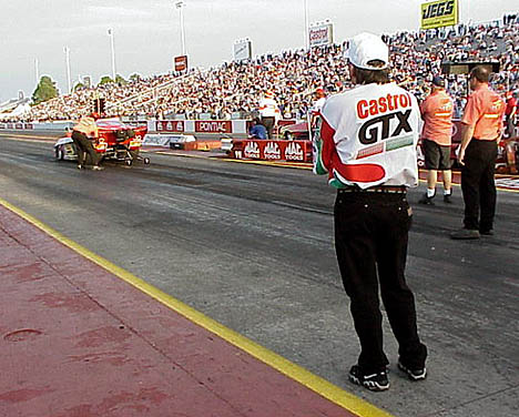 John Force checks out the Pro Mod action at Gainesville. Photo by Brian Wood