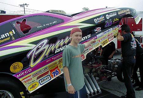 Jonathan Jones points out the DRL decal on Bunny Burkett's machine. Photo by Tim Pratt