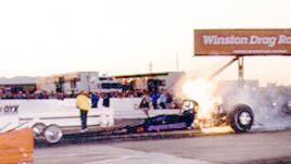 Gary fireballs the Sugarman car at Phoenix. Photo by Auto Imagery