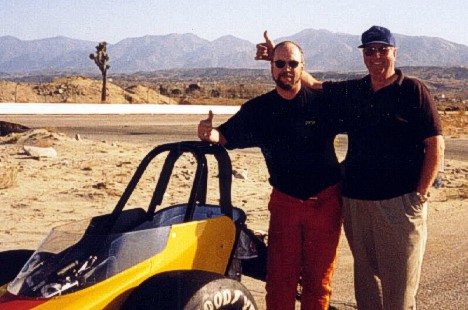 Kol and Ron Johnson after Kol obtained his license. Photo thanks to Ron Johnson