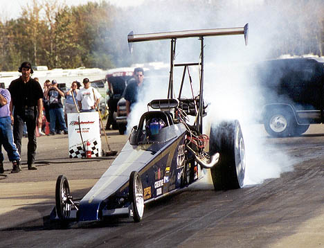 Serge Dion burns out in the Sitko Family Racing Top Alcohol Dragster. Photo by Sheryl Ogonoski