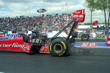 Kenny Bernstein beats Jim Head to the launch.