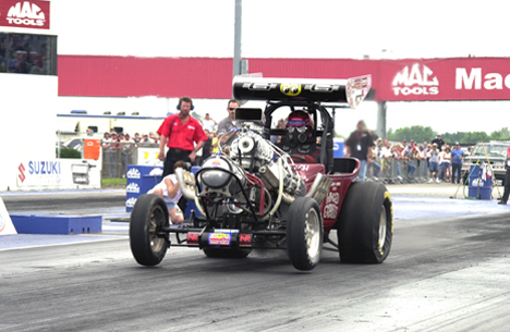 Mike Boyd in the famed Winged Express by Mike Garland