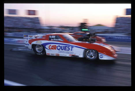 Scott Ray blasts by during the Pro Mod session at Indy 2002. Photo by Ron Lewis