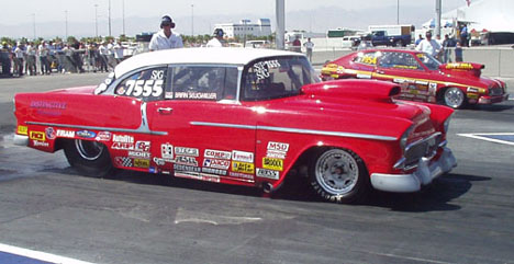 The red 55 hardtop was entered by local Brian Seligmiller. The side trim and spears are painted on. This one is sb Chevy powered.
