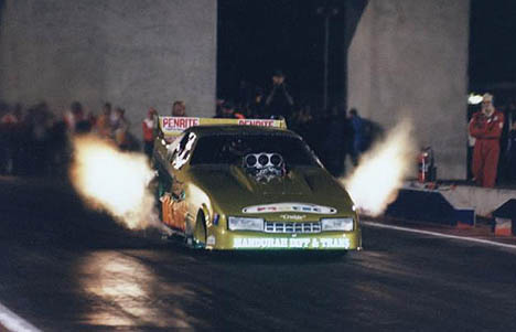 Here's another angle as Dobbo gets big flames in the Greene Machine. Photo by Jon Gall