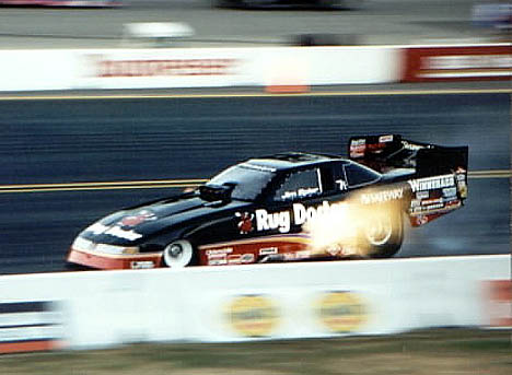 Jim Epler gets big flames at SIR in 1995. Photo by Ralph Reiter