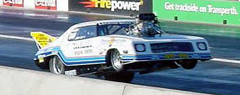 John Zappia goes into a powerstand with his 220 mph Holden Monaro. Photo by Luke Nieuwhof