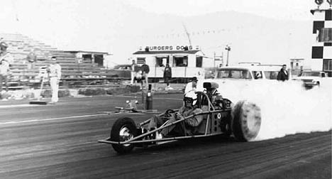 Cook Bros. & Jahns' wild three wheeler laying down a fogbank at San Gabriel 1963. Photo thanks to Troy Cagle