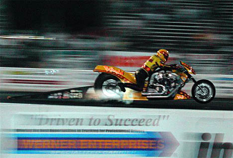 Mark Cox's Nitro Harley at the IHRA Mid Atlantic Nationals with Header Flames! Photo by Chris Simmons