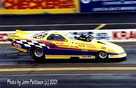 Lyle Greenberg breaks the bolts on the body panel after severe tire shake. Photo by John Pattison