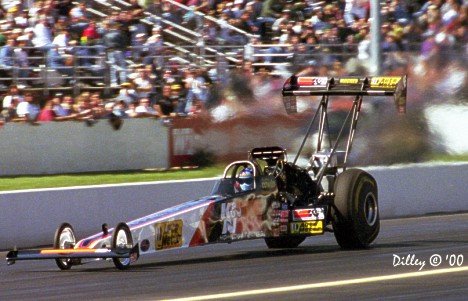 Andrew Cowin puts off heat waves from his K&N Filters top fueler. Photo by Ron Dilley