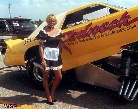 Maid service, anyone? The crewperson with the Redneck Street Rods Lincoln Mark VII caused quite a stir at Indy 2000. Photo by Wes Shuman/David Ray