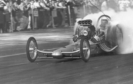 Chris Karamesines with injectors wide open and the slicks blazing. Photo from the Cagle Archives