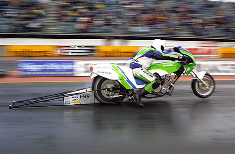 Neil Diggins' Funny Bike speeds past at the 2002 Cannonball event. Photo by Sharkman