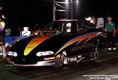 James Libby's immaculate Camaro Top Alcohol Funny Car at night. Photo by James Morgan