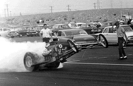 Tommy gets it up in the air, cocks the wheels, and smokes 'em off! Photo by Steve Gibbs