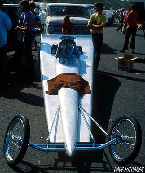 Fred Mooneyham's streamliner top fueler in the pits provides the inspiration... Photo by Dave Milcarek
