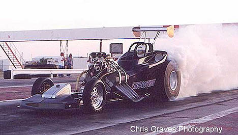 Donnie Massey's Showtime Outlaw Fuel Altered lays down some smoke. Photo by Chris Graves