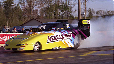 Paul Gill is one of the hardest running cars in brutal NHRA Division 1. Photo by James Morgan