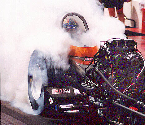 Rance McDaniel boils the hides in the Champion Speed Shop car at Goodguys Las Vegas. Photo by Ron Lahr