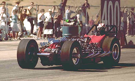 Ron Pellegrini driving TV Tommy Ivo's Four-Motor Buick Dragster in 1962. Photo by Pete Garramone