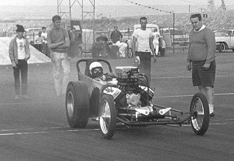 Steve Evans DRIVING at San Gabriel, 1962. Photo by Steve Gibbs