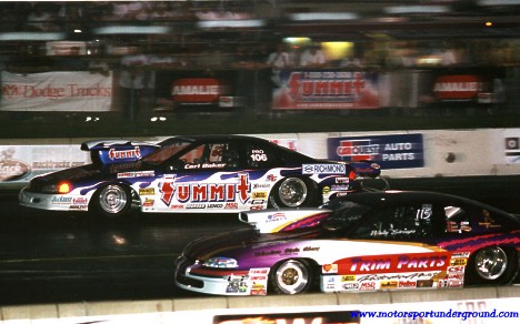 Carl Baker vs Wally Stroupe in hot IHRA Pro Stock Action. Photo by James Morgan