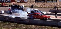 Jay Mageau's beautiful '57 Chevy begins its burnout. Photo thanks to Girl Trouble Racing