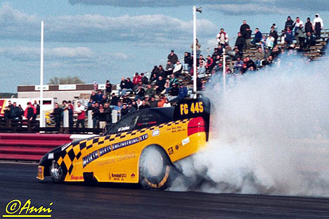 Alan Bates' British Fuel Funny Car lays down some smoke. Photo by Anni Valder