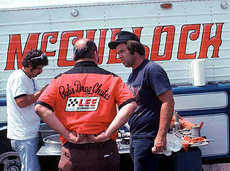 Ed "The Ace" McCulloch confers with Bob Farmer at the 1974 Summernationals. Photo by Peter Kumble