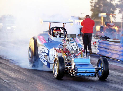 Steve Tryon smokes the hides in this great looking fuel altered. Photo by Bryan Ellis