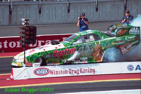 John Force played The Grinch with the other funny car drivers in 2000, winning his 10th title. Photo by Robert Briggs