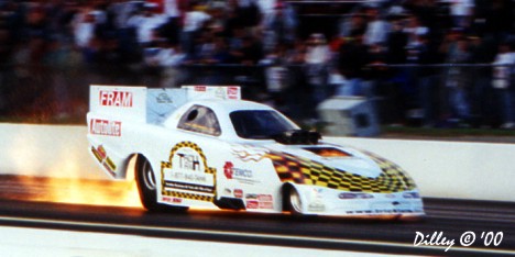 Fire in the Headers -- Bob Gilbertson Getting Warm. Photo by Ron Dilley