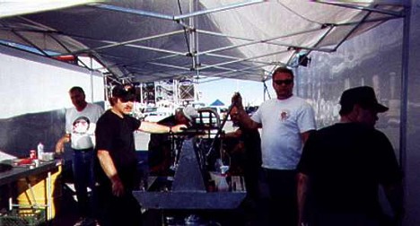 The crew preps the car for another qualifying shot. Photo by Butch Blackberg