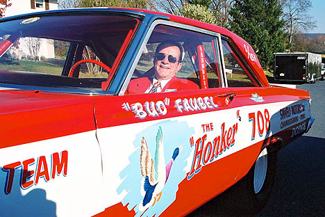 Bud Faubel sits behind the wheel of his car, the "Honker." Photo by Greg Gage