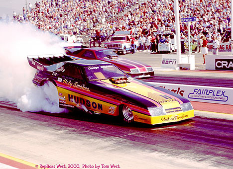 Tom West has been part of the SoCal scene for years. Here he shoots Jim Murphy's Funny Car in around '88 or '89. Photo by Tom West