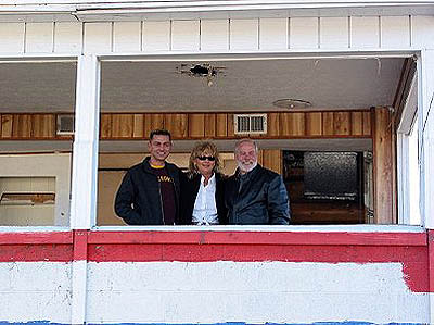 Royce and Linda Miller and son Chris (R to L) take one final look out the tower. Photo by Stephen Jones